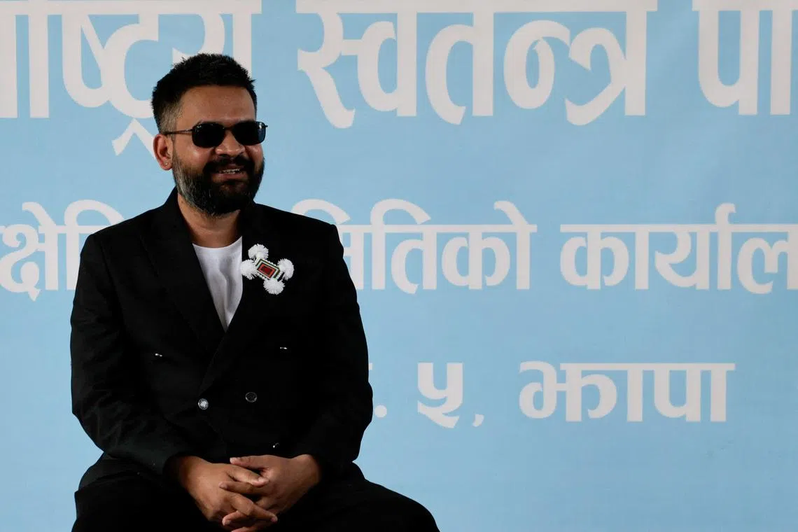 Balendra Shah, a rapper-turned-politician and the prime ministerial candidate for Rastriya Swatantra Party (RSP), smiles as he speaks with people at RSP office ahead of Nepal's general election, in Damak, Jhapa district, Nepal, February 25, 2026. REUTERS/Navesh Chitrakar