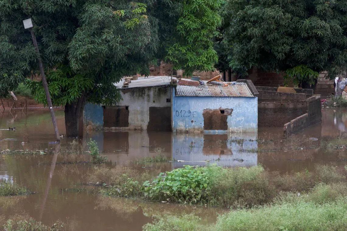 A house stands partially submerged in floodwater after weeks of heavy rainfall in Maputo, Mozambique, January 21, 2026. REUTERS/Amilton Neves