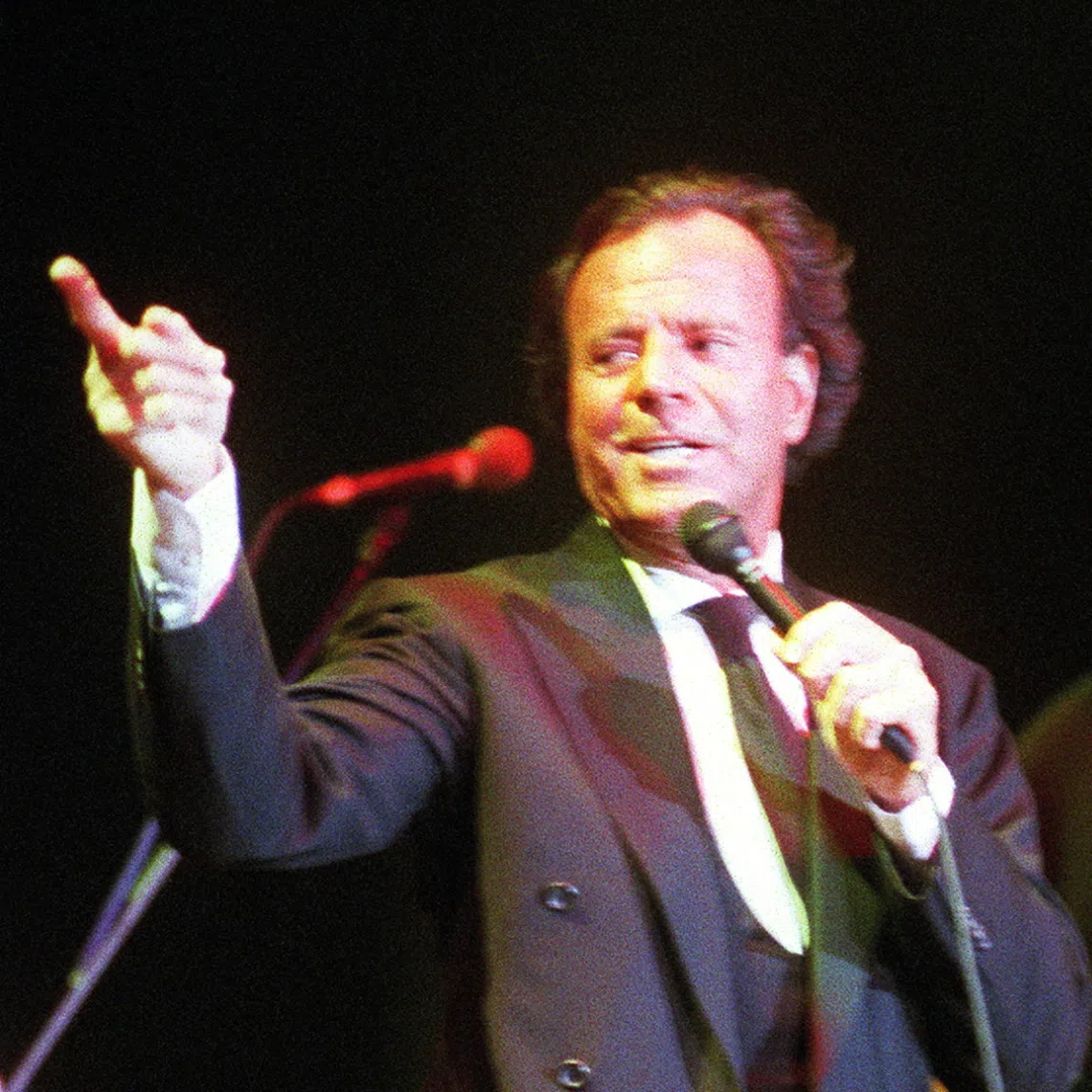 Two women allege they suffered sexual abuse and forced labour while working at the Spanish singer Julio Iglesias’ properties.