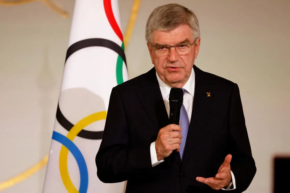 FILE PHOTO: International Olympic Committee (IOC) President Thomas Bach gestures as he delivers a speech during a reception for international journalists accredited for the Paris 2024 Olympic Games at the Elysee Presidential Palace, in Paris, France July 22, 2024, ahead of Paris 2024 Olympic and Paralympic games.     LUDOVIC MARIN/Pool via REUTERS