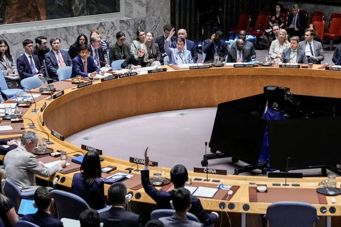 UN Security Council members voting on a resolution by Russia and China to delay by six months the reimposition of sanctions on Iran, during the UN General Assembly in New York on Sept 26.