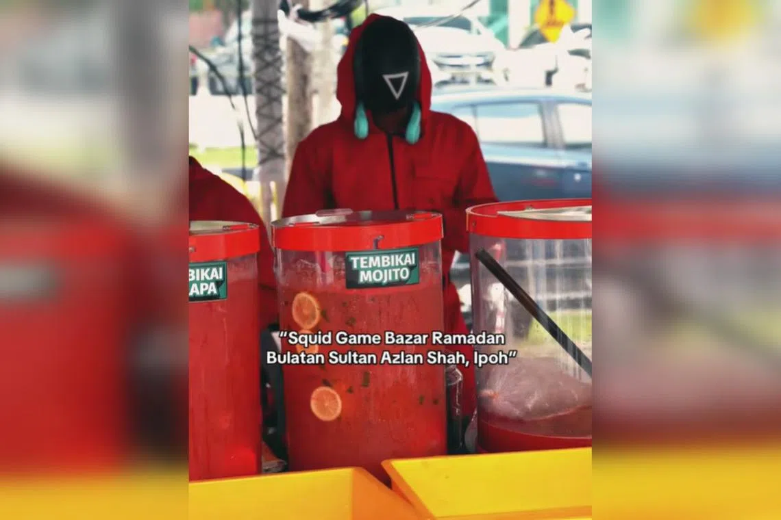 Squid Game guards are serving fruit juice at this Ramadan bazaar in Ipoh