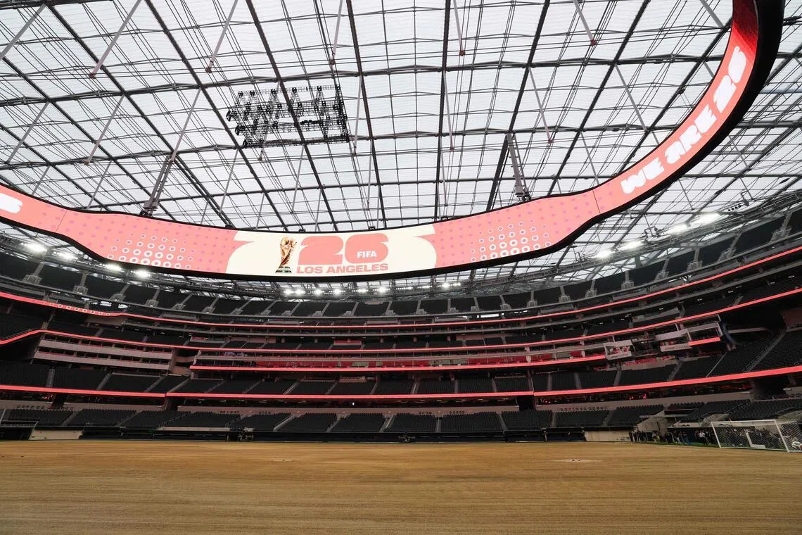 An expanded pitch surface area, which required the removal of corner seating and a raised custom field platform, awaits the installation of grass at Los Angeles’ SoFi Stadium on May 12.