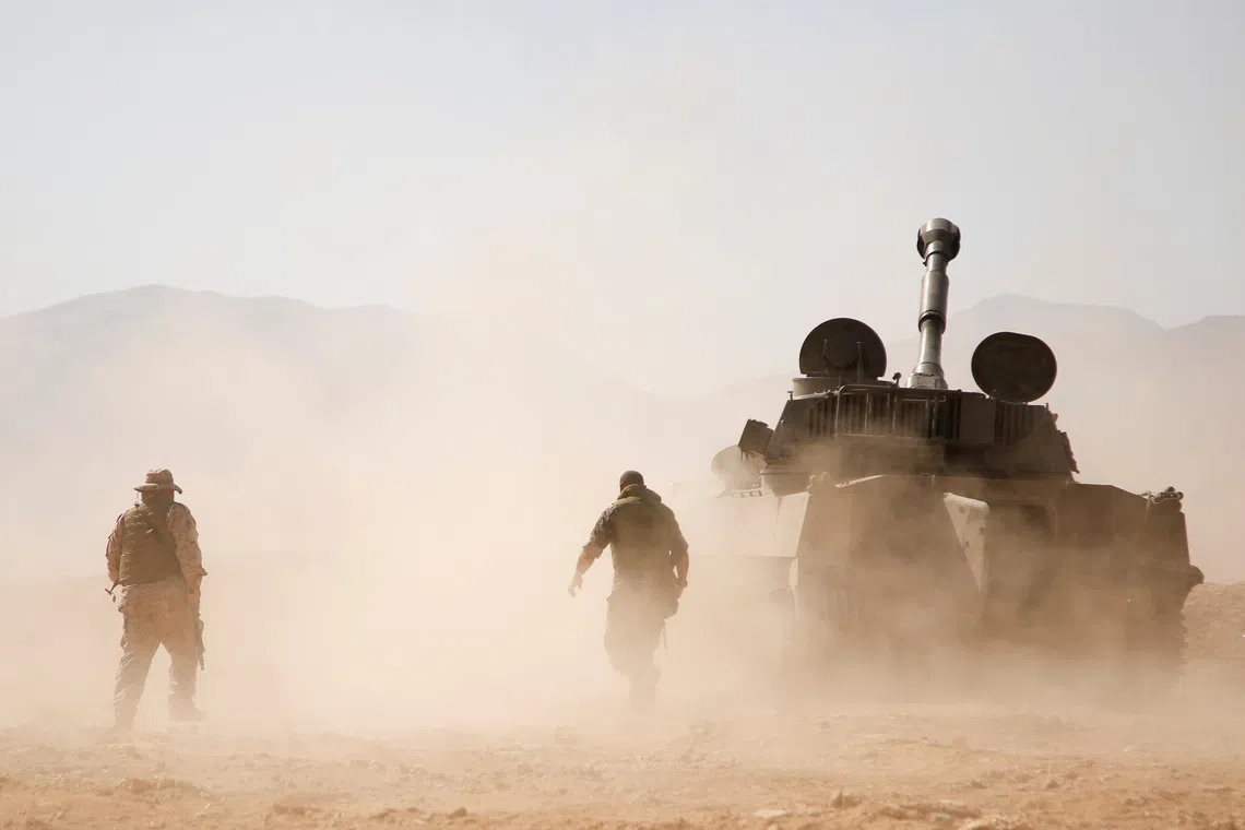 A Hezbollah fighter beside a military tank in Western Qalamoun, Syria, in 2017. Washington has long sought to reduce Iran’s influence in countries in the Middle East.