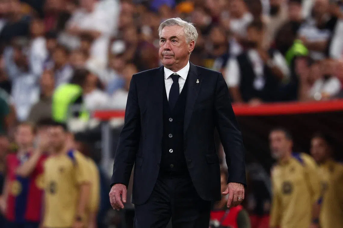 FILE PHOTO: Soccer Football - Spanish Super Cup - Final - FC Barcelona v Real Madrid - King Abdullah Sports City, Jeddah, Saudi Arabia - January 12, 2025 Real Madrid coach Carlo Ancelotti reacts during the match REUTERS/Pedro Nunes/File Photo