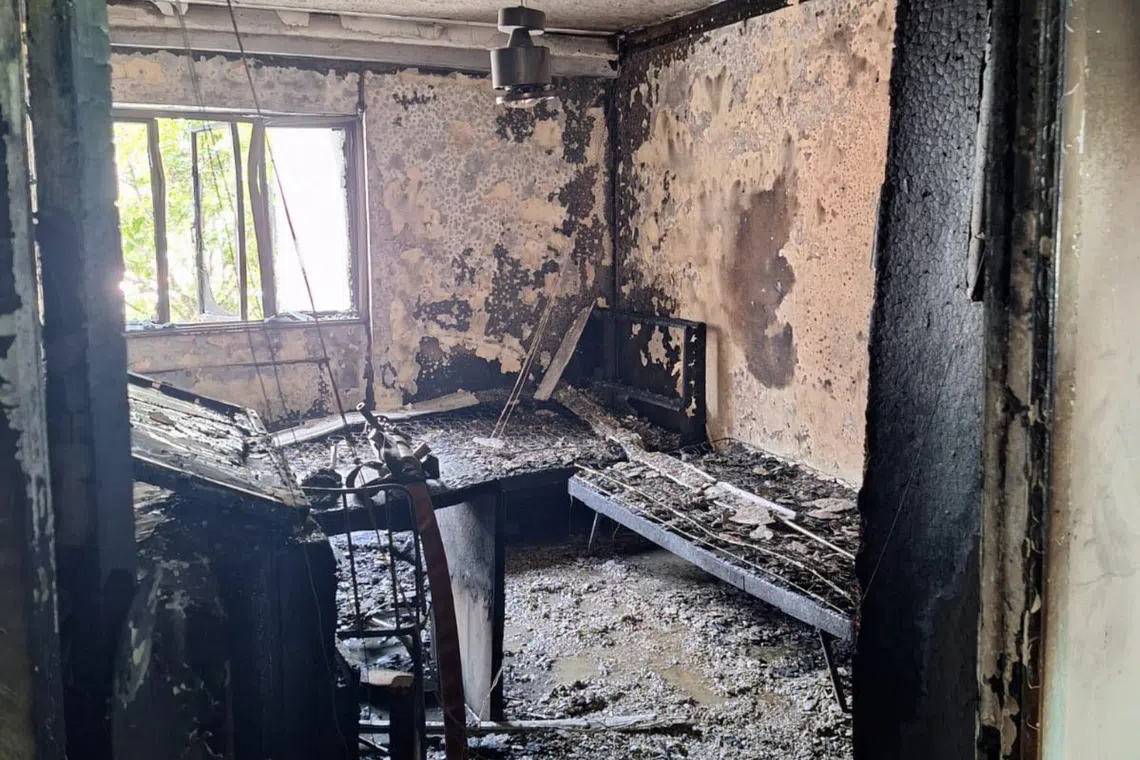 A bedroom in a second-floor unit at Block 128 Yishun Street 11 was on fire.