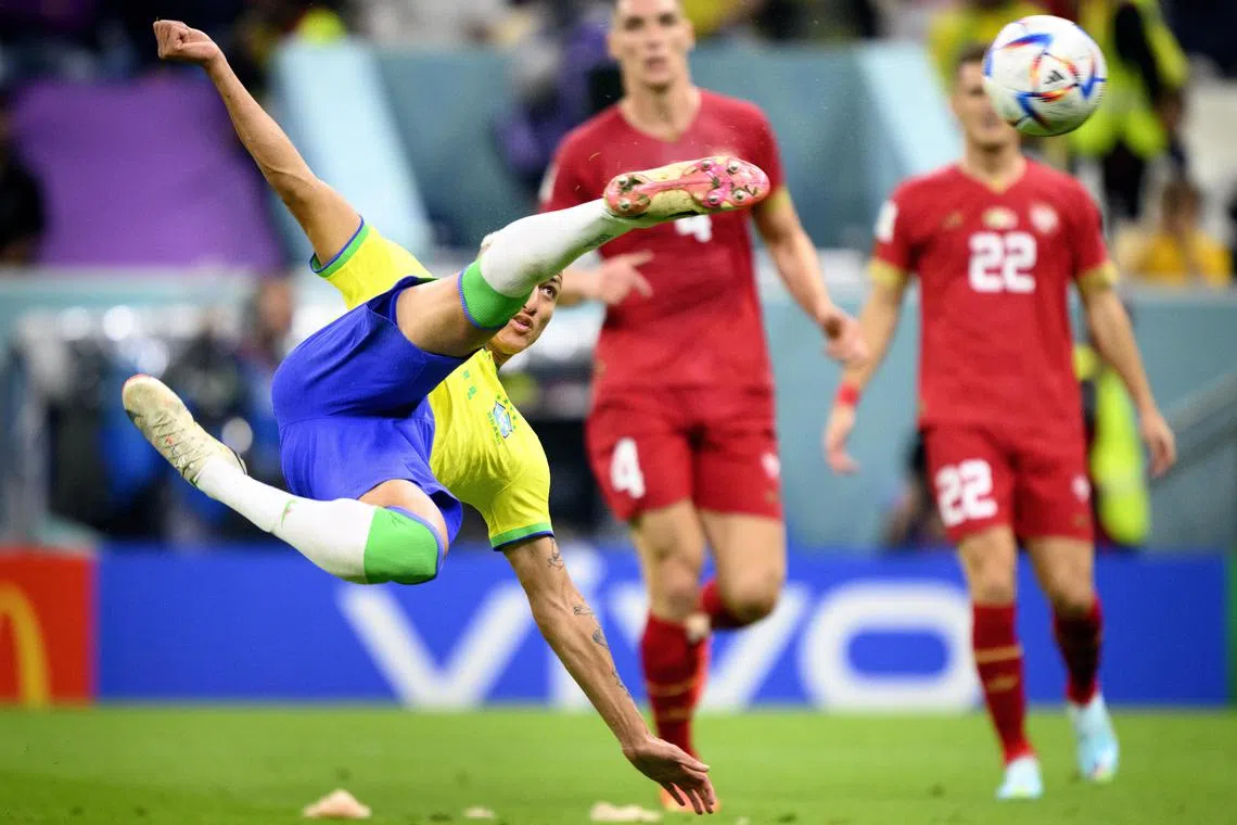 Brazil forward Richarlison scoring with a stunning acrobatic effort to give Brazil a 2-0 lead against Group G rivals Serbia at Lusail Stadium.
