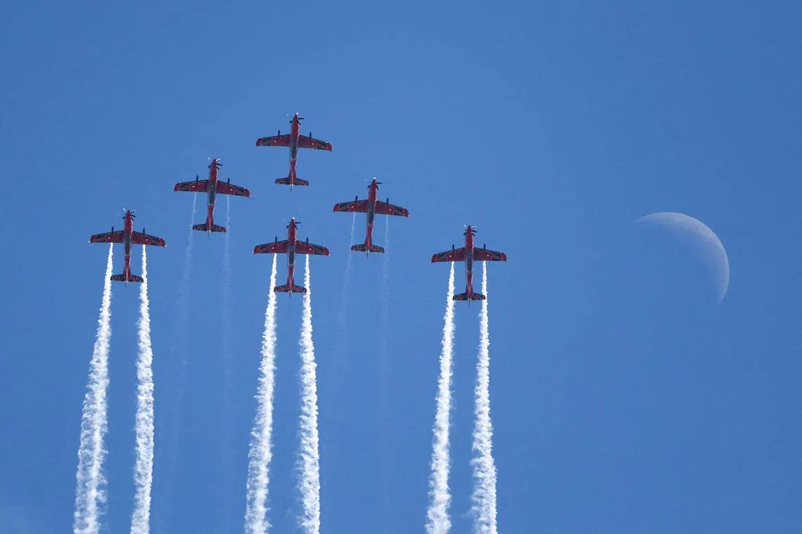 Roulettes PC-21 of the Royal Australian Air Force perform in formation as part of their aerobatic display during the Australian International Airshow in Avalon, Australia March 25, 2025. REUTERS/Hollie Adams TPX IMAGES OF THE DAY