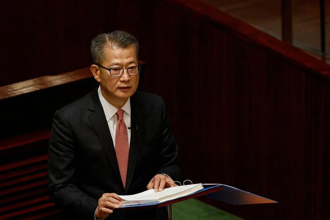FILE PHOTO: Hong Kong's Finance Secretary Paul Chan delivers the annual budget address at the Legislative Council in Hong Kong, China Feburary 22, 2023. REUTERS/Tyrone Siu/File Photo