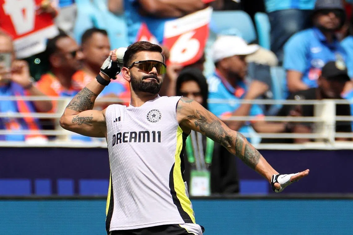 FILE PHOTO: Cricket - ICC Men's Champions Trophy - Final - India v New Zealand - Dubai International Stadium, Dubai, United Arab Emirates - March 9, 2025 India's Virat Kohli during the warm-up before the match REUTERS/Satish Kumar/File Photo