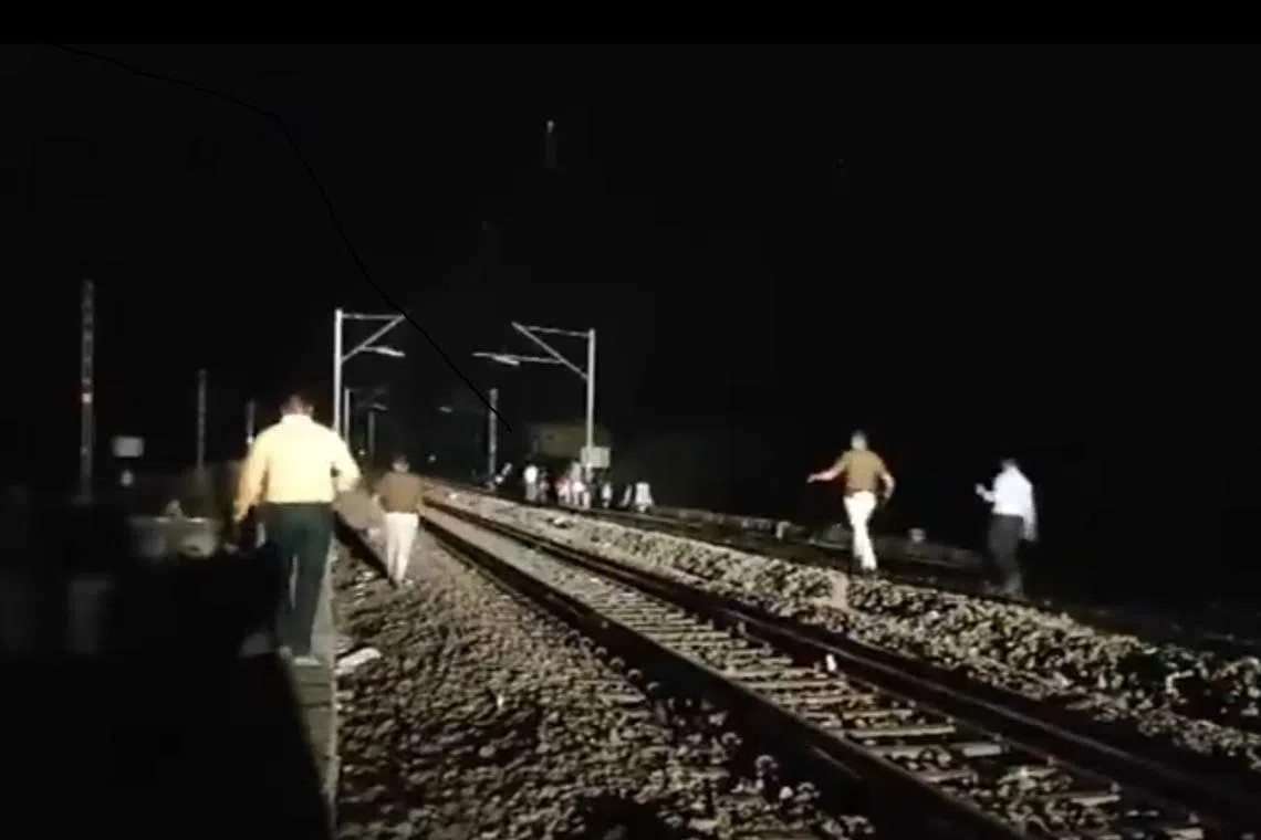 A screenshot from the scene of the incident, in which a person reportedly pulled the train's alarm chain and passengers were hit by another train as they disembarked.
