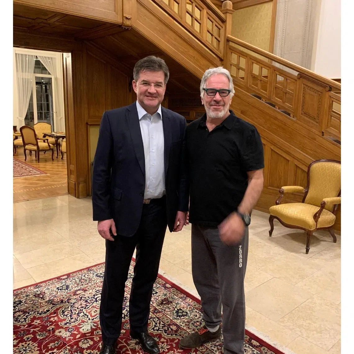 Jeffrey Epstein and Miroslav Lajcak, a Slovak politician and diplomat and former President of the United Nations General Assembly, pose in this undated handout image from the estate of late financier and convicted sex offender Jeffrey Epstein, released by Democrats on the House Oversight Committee in Washington, D.C., U.S., on December 18, 2025. House Oversight Committee Democrats/Handout via REUTERS