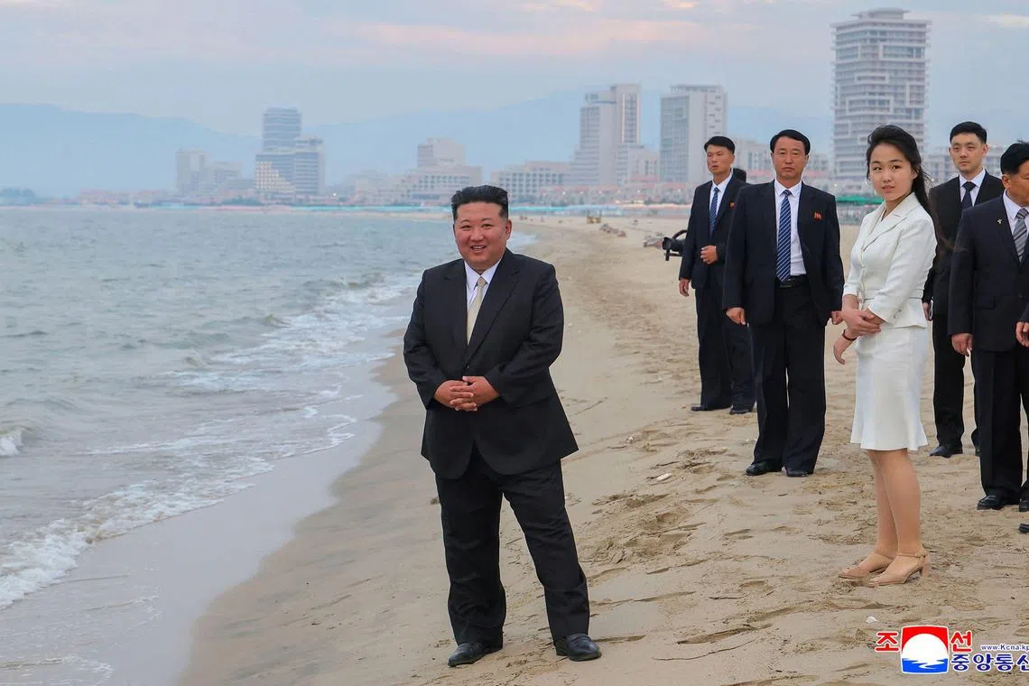 This picture taken on June 24, 2025 and released by North Korea's official Korean Central News Agency (KCNA) on June 26, 2025 shows North Korean leader Kim Jong Un (L) and his daughter Kim Ju Ae (front R) visiting the Wonsan Kalma coastal tourist area in Kangwon Province, North Korea. North Korea opened a massive resort area on its east coast, state media said on July 2, with the tourism pet project of leader Kim Jong Un reportedly set to welcome Russian guests later this month.
Dubbed "North Korea's Waikiki" by South Korean media, the Wonsan Kalma Coastal Tourist Area can accommodate nearly 20,000 people, according to Pyongyang, which previously described it as "a world-class cultural resort". (Photo by KCNA VIA KNS / AFP) / South Korea OUT / ---EDITORS NOTE--- RESTRICTED TO EDITORIAL USE - MANDATORY CREDIT "AFP PHOTO/KCNA VIA KNS" - NO MARKETING NO ADVERTISING CAMPAIGNS - DISTRIBUTED AS A SERVICE TO CLIENTS
THIS PICTURE WAS MADE AVAILABLE BY A THIRD PARTY. AFP CAN NOT INDEPENDENTLY VERIFY THE AUTHENTICITY, LOCATION, DATE AND CONTENT OF THIS IMAGE. / 