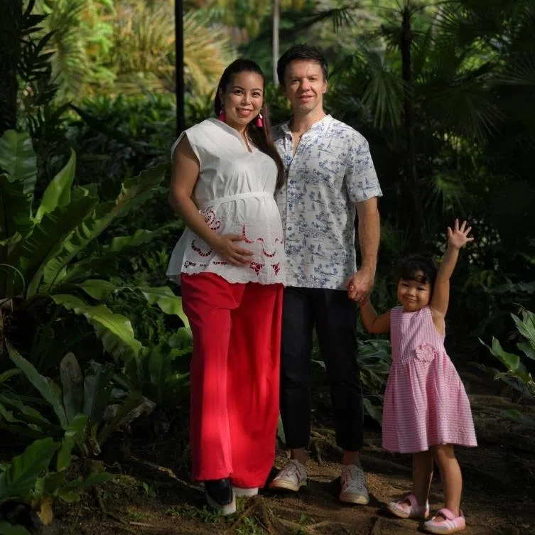 Former Kiss92 DJ Charmaine Yee, her husband Camilo Paredes and their daughter Mila.