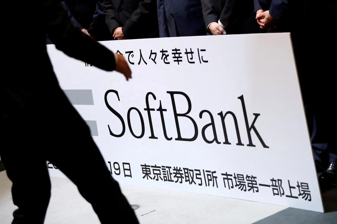 FILE PHOTO: SoftBank Corp. placard is prepared during a ceremony to mark the company's debut on the Tokyo Stock Exchange in Tokyo, Japan December 19, 2018.   REUTERS/Issei Kato/File Photo/File Photo