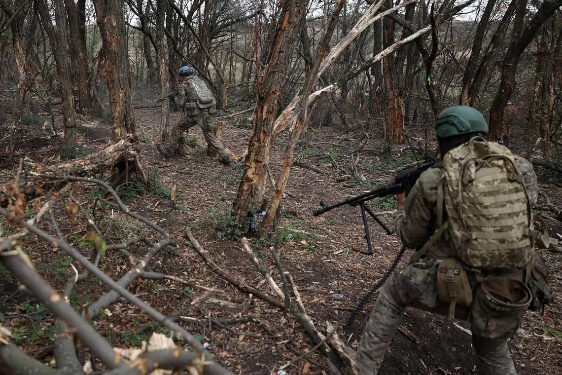 Ukrainian servicemen take part in tactical training at an undisclosed location in Ukraine's Donetsk region.