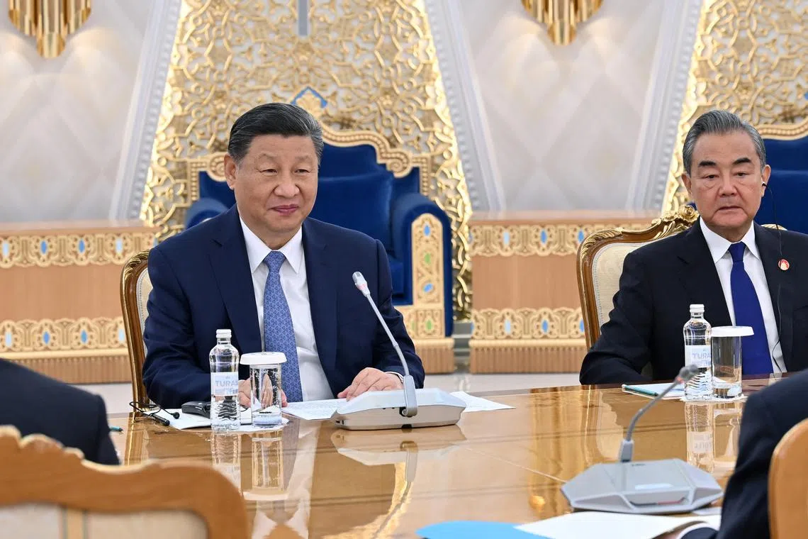China's President Xi Jinping and Foreign Minister Wang Yi attend a meeting with Kazakhstan's President Kassym-Jomart Tokayev in Astana, Kazakhstan July 3, 2024. Press Service of the President of Kazakhstan/Handout via REUTERS