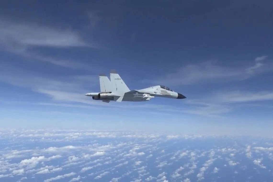 An undated photo provided by the U.S. Department Of Defense shows a Chinese fighter jet that, according to the U.S. military on Thursday, Dec. 29, 2022, flew dangerously close to a U.S. Air Force aircraft that was conducting routine operations over the South China Sea on Dec. 21, nearly causing the planes to collide. (U.S. Department of Defense via The New York Times) —NO SALES; EDITORIAL USE ONLY —