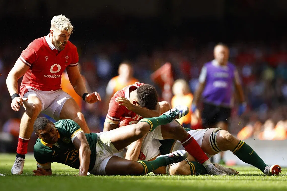 Rugby Union - Wales v South Africa - World Cup warm-up - Principality Stadium, Cardiff, Wales, Britain - August 19, 2023 Wales' Rio Dyer and South Africa's Damian Willemse react after sustaining injuries Action Images via Reuters/John Sibley/ File photo