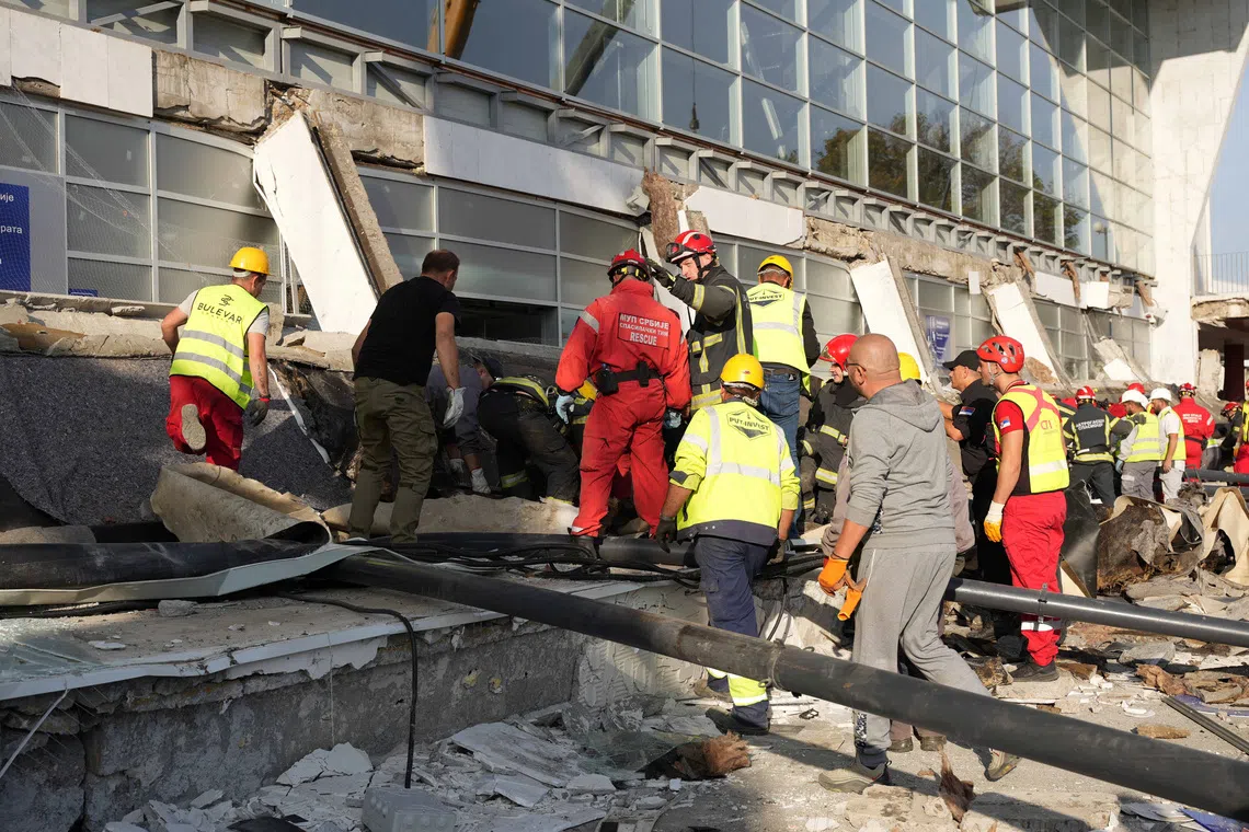 FILE PHOTO: Rescue workers remove debris after a roof collapsed at the entrance to a railway station in Novi Sad, Serbia, November 1, 2024. Serbian Interior Ministry/Handout via REUTERS/File Photo