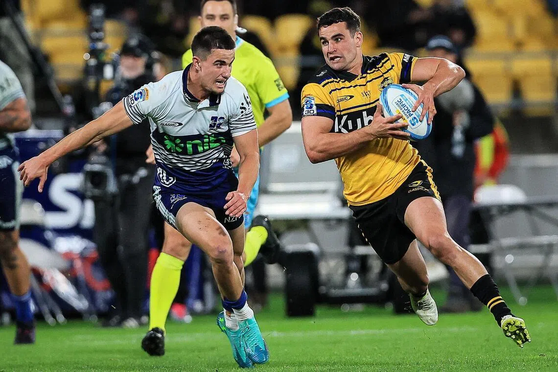 Wellington Hurricanes' Josh Moorby trying to get past Auckland Blues' Payton Spencer in their Super Rugby Pacific semi-final in Wellington on June 13, 2026.