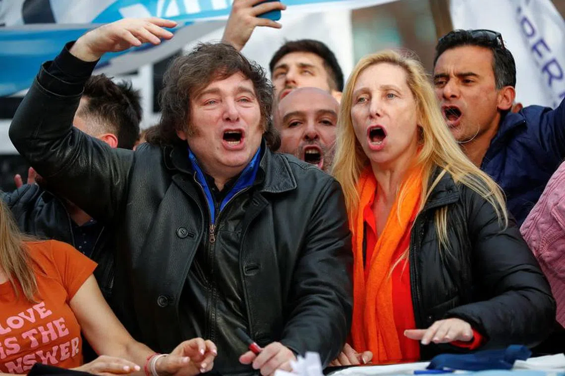 Argentine presidential candidate Javier Milei for La Libertad Avanza party and his sister Karina Milei gesture during a campaign rally in La Plata, Buenos Aires, Argentina, September 12, 2023. REUTERS/Agustin Marcarian