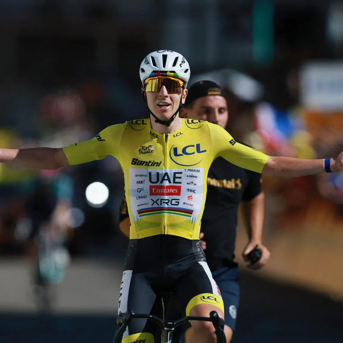 UAE Team Emirates XRG’s Tadej Pogacar celebrates winning Stage 19 of the Tour de France on July 24.