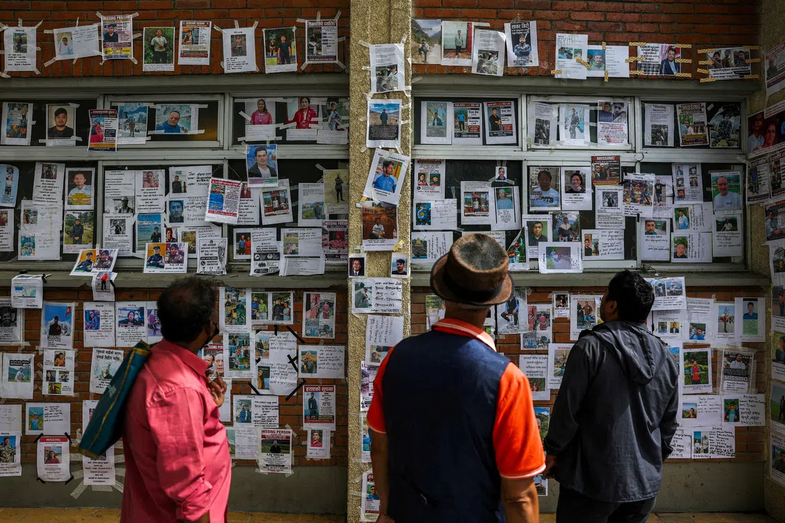 Nepalis pin hopes on 'wall of the missing' in hunt for relatives after deadly flood