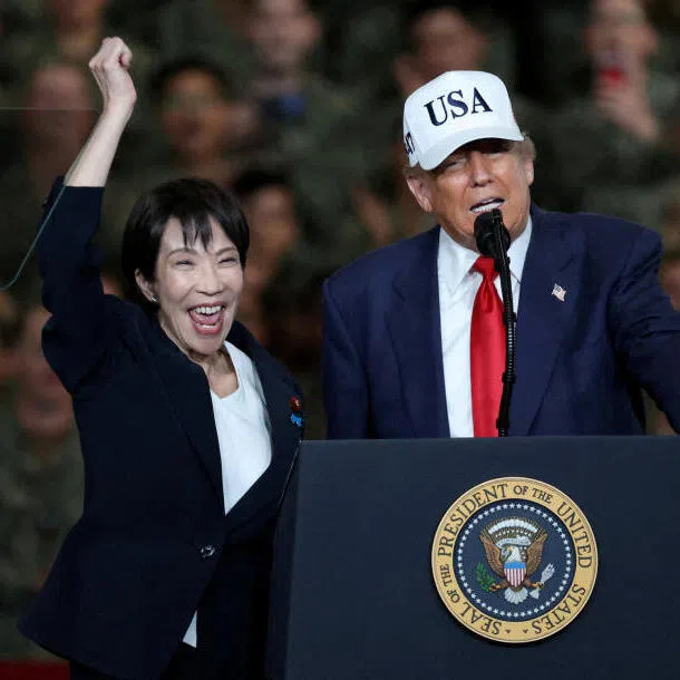 Japanese Prime Minister Sanae Takaichi and  US President Donald Trump aboard the aircraft carrier USS George Washington, during their visit to the US Navy's Yokosuka base in Japan in October.