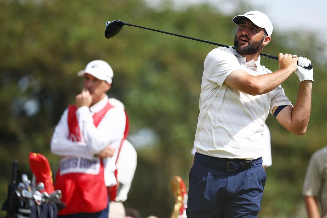 Golf - The 154th Open Championship - Royal Birkdale Golf Club, Southport, Britain - July 19, 2026 Scottie Scheffler of the U.S. watches his tee shot on the 2nd hole during the final round REUTERS/Phil Noble