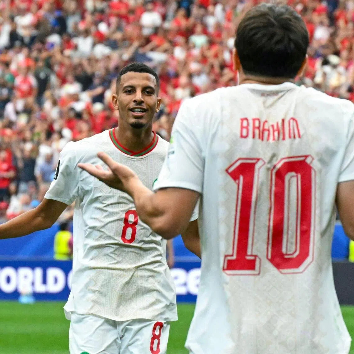 Azzedine Ounahi celebrating with Brahim Diaz after scoring Morocco’s second goal during their 3-0 World Cup last-16 win over Canada at NRG Stadium in Houston on July 4.