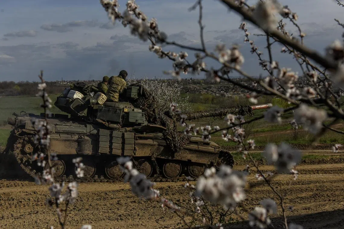 epa10567789 A tank moves on the road, at undisclosed location near Bakhmut, Donetsk region, Ukraine, 10 April 2023. Russian troops entered Ukrainian territory on 24 February 2022, starting a conflict that has provoked destruction and a humanitarian crisis. EPA-EFE/OLEG PETRASYUK