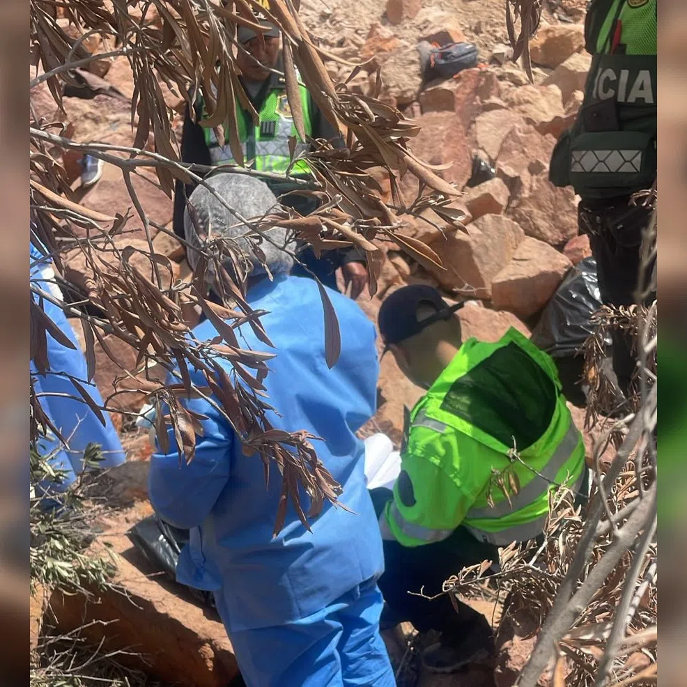 Officials working at the scene of the accident in the mountainous Arequipa region of southern Peru.