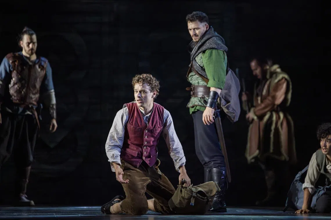 Actor Rarmian Newton (playing Frodo, in foreground) in The Lord Of The Rings – A Musical Tale stage production.
