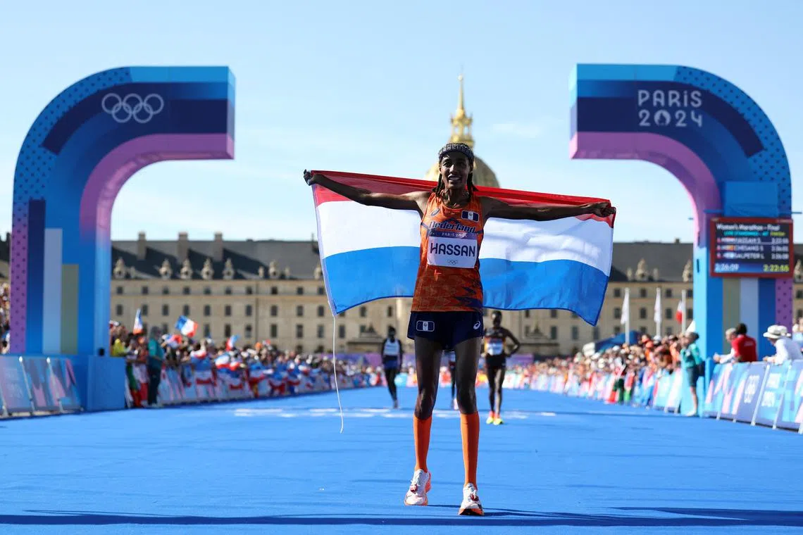 Sifan Hassan of Netherlands celebrates at Invalides after winning gold in the Paris Olympics women's marathon on Aug 11, 2024.