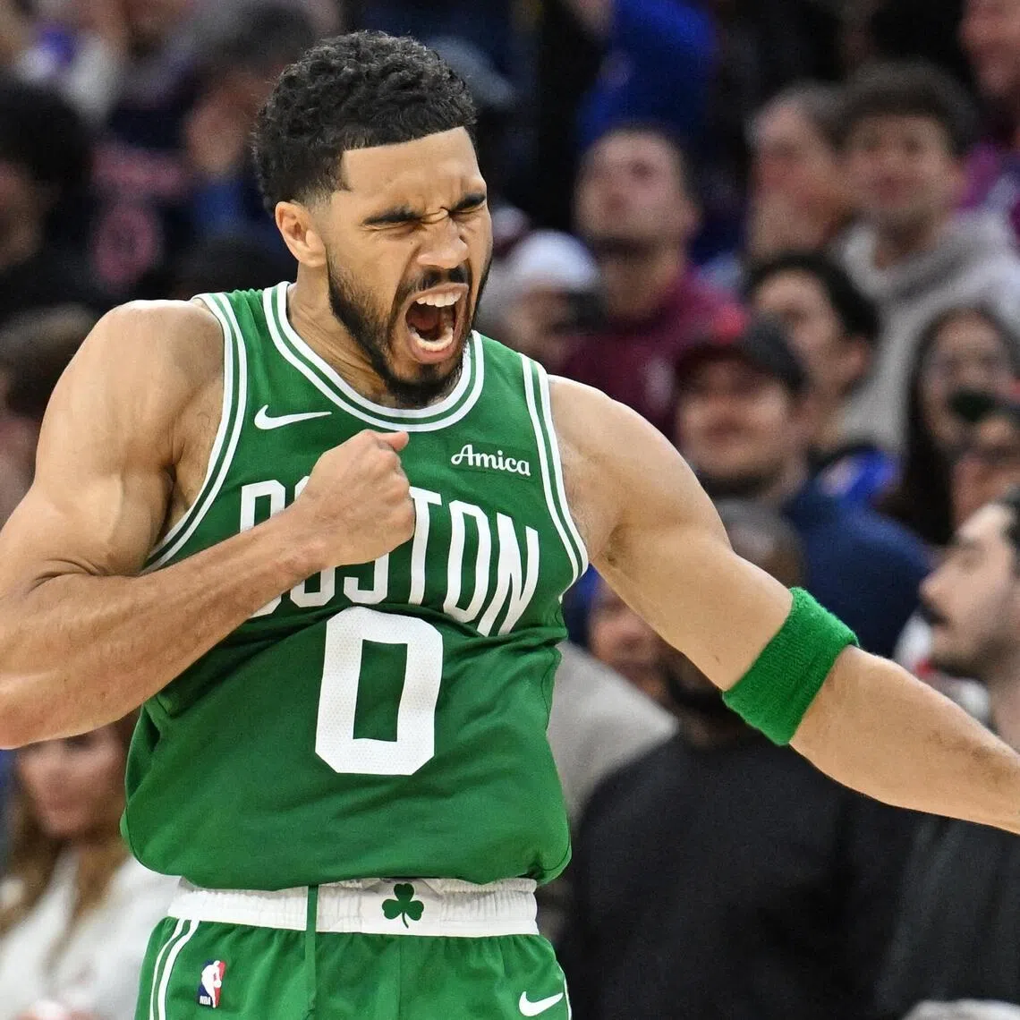 Apr 24, 2026; Philadelphia, Pennsylvania, USA; Boston Celtics forward Jayson Tatum (0) celebrates his three point basket against the Philadelphia 76ers late in the fourth quarter at Xfinity Mobile Arena. Mandatory Credit: Eric Hartline-Imagn Images