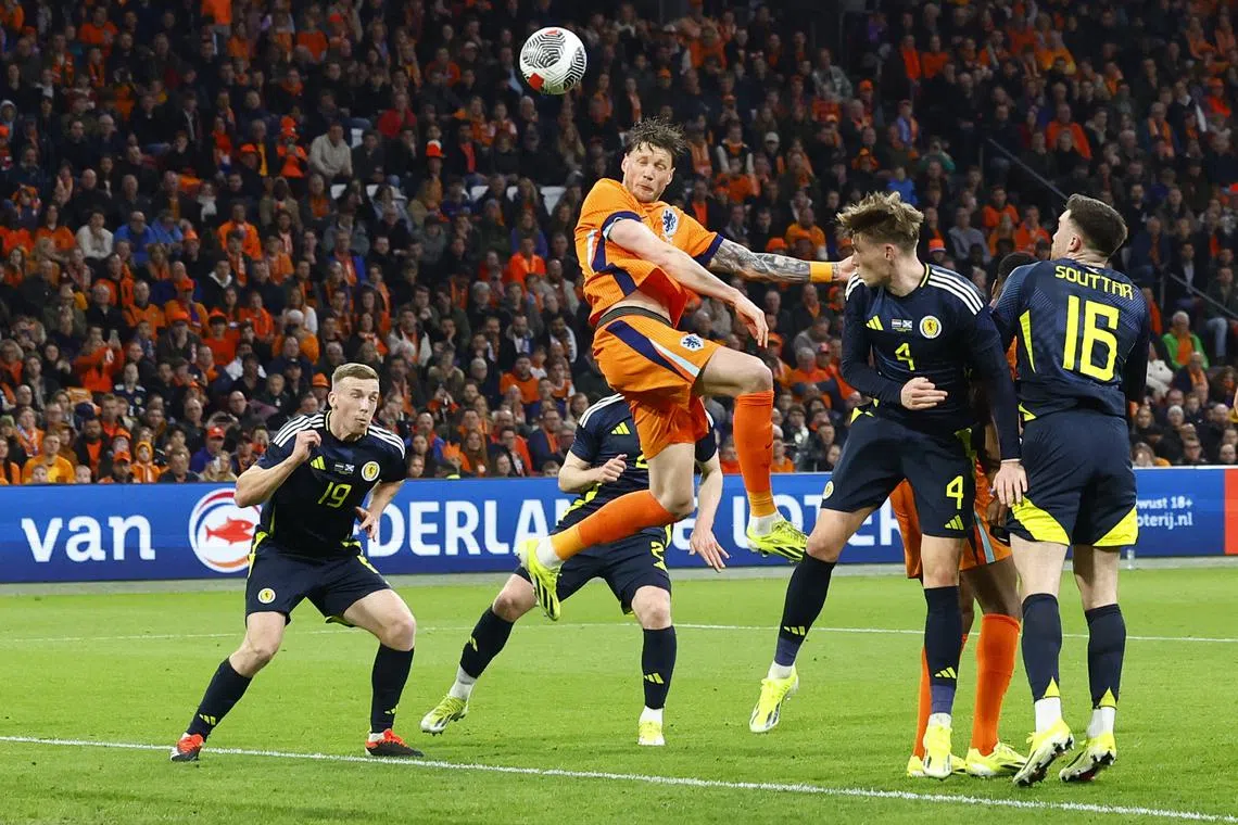 Soccer Football - International Friendly - Netherlands v Scotland - Johan Cruijff Arena, Amsterdam, Netherlands - March 22, 2024 Netherlands' Wout Weghorst scores their third goal REUTERS/Piroschka Van De Wouw