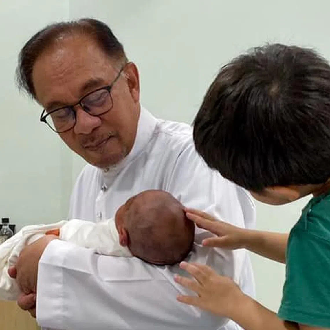 Malaysian PM Anwar Ibrahim took to social media on Wednesday to show off the arrival of his half-Japanese grandchild Nurul Isra Mitsuki.