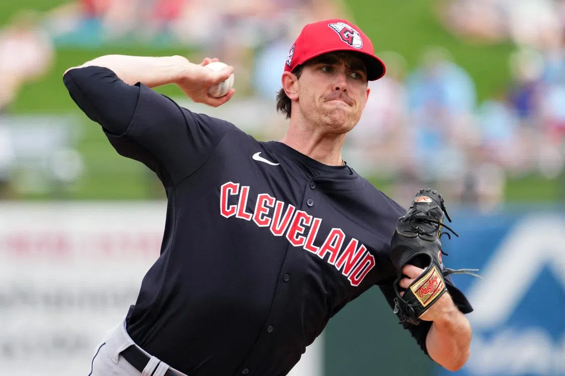 Mar 12, 2024; Surprise, Arizona, USA; Cleveland Guardians starting pitcher Shane Bieber (57) bats against the Texas Rangers during the second inning at Surprise Stadium. Joe Camporeale-USA TODAY Sports/File Photo
