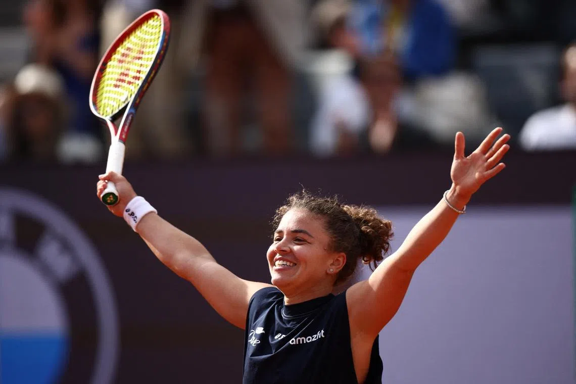 Italy's Jasmine Paolini celebrates after winning her semi final match against Peyton Stearns of the US. 