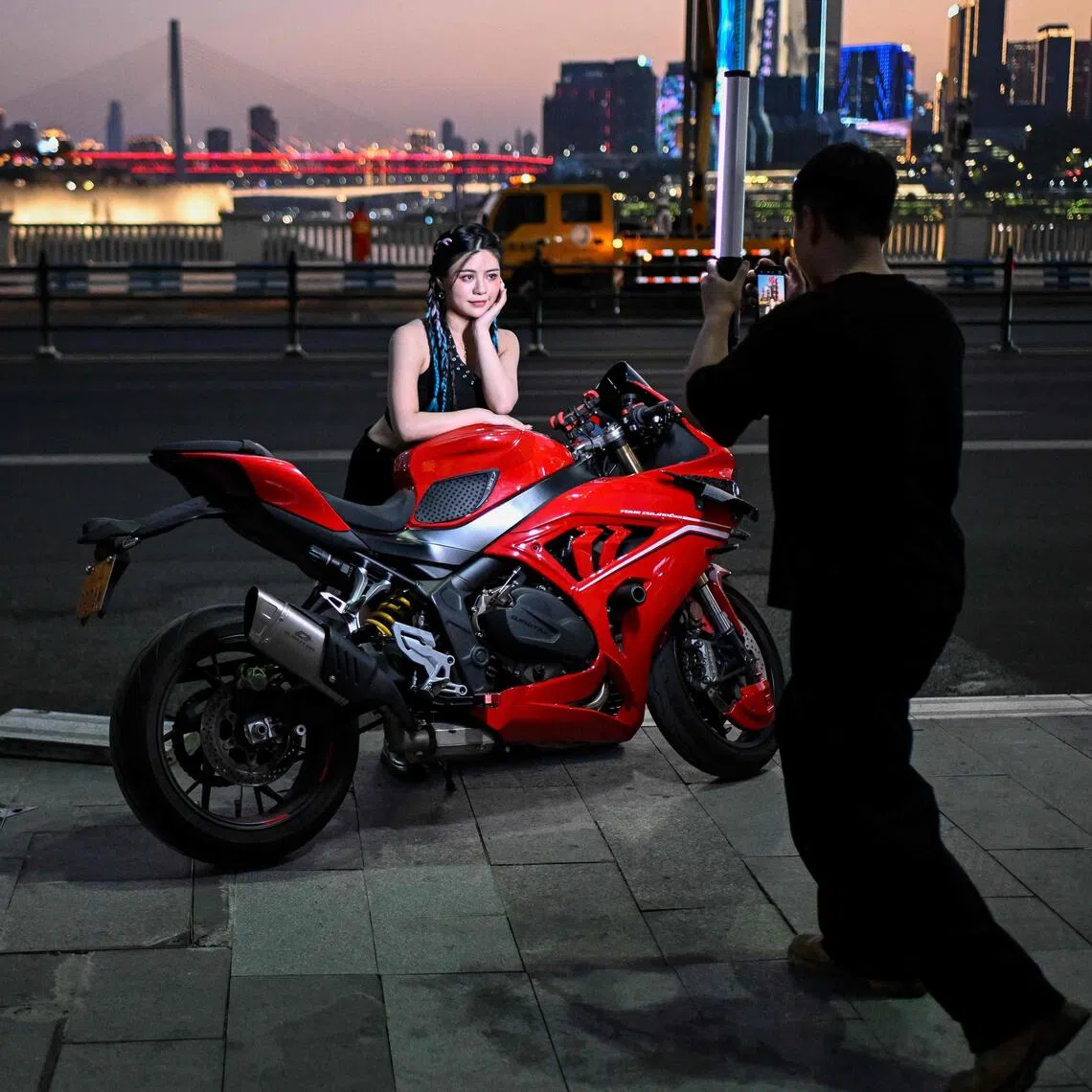 The packages of choreographed photos and videos – in which customers are swept off their feet by dashing riders and cruise past the city’s landmarks in slow motion – cost upwards of 200 yuan (S$38).