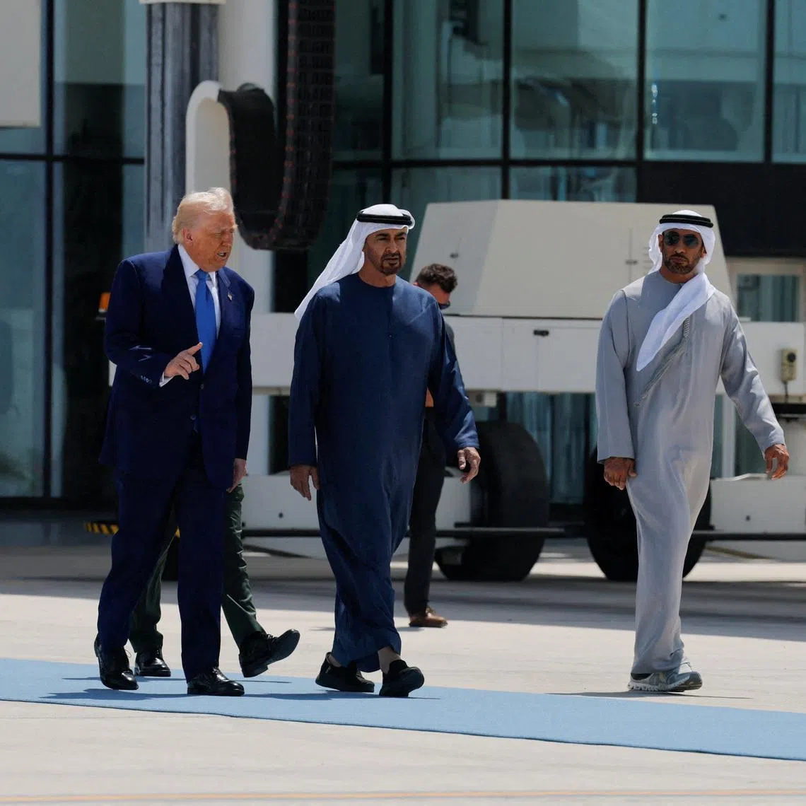 UAE President Sheikh Mohamed bin Zayed Al Nahyan accompanying US President Donald Trump as he departs Abu Dhabi on May 16, 2025.