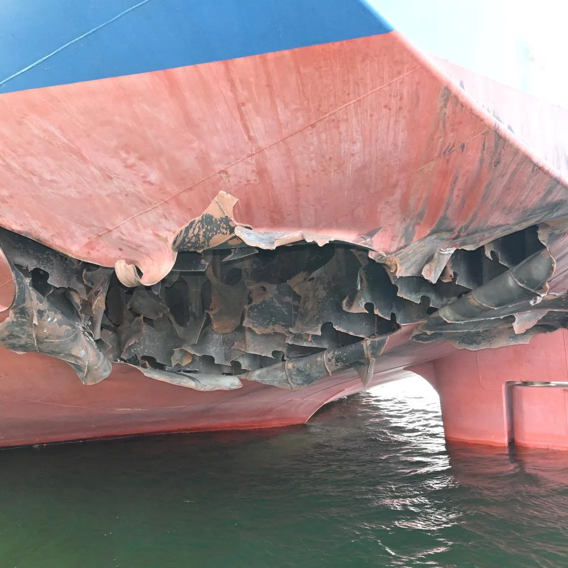 FILE PHOTO: The damaged stern of a bulk carrier operated by South Korean shipper HMM, after it was struck by two unidentified objects on May 4 while stranded in the Strait of Hormuz, in this handout picture released on May 10, 2026. South Korean Foreign Ministry/Handout via REUTERS/File Photo