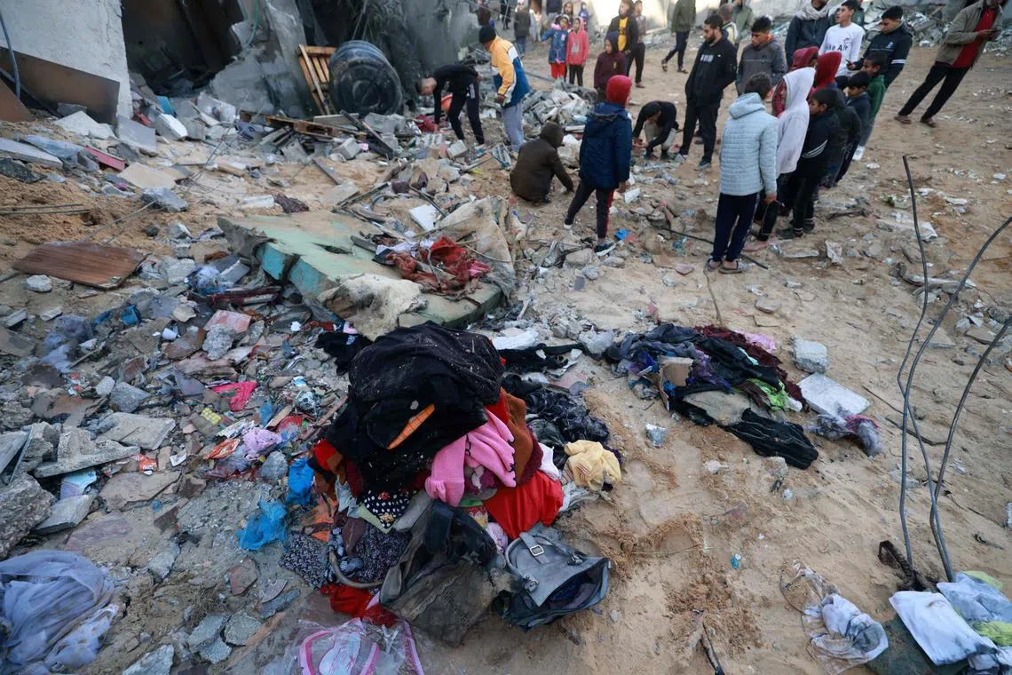 Personal objects salvaged from the rubble of homes are piled up following Israeli bombardment in Rafah in the southern Gaza Strip on February 3, 2024, as fighting continues between Israel and the Palestinian Hamas group. (Photo by Mohammed ABED / AFP)