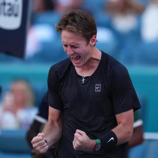 Sebastian Korda of the United States reacts after defeating Carlos Alcaraz of Spain during Day 6 of the Miami Open at Hard Rock Stadium, Miami Gardens, Florida.