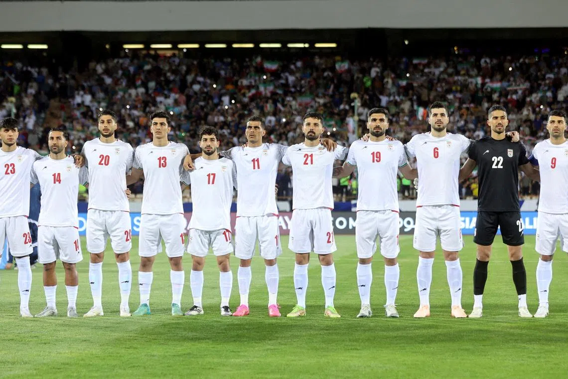 FILE PHOTO: Soccer Football - World Cup - Asian Qualifiers - Group A - Iran v North Korea - Azadi Stadium, Tehran, Iran - June 10, 2025 Iran players line up before the match  Majid Asgaripour/WANA (West Asia News Agency) via REUTERS /File Photo