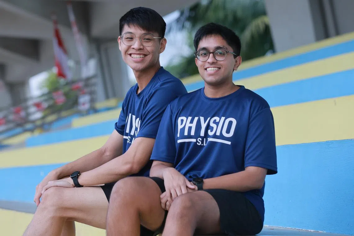 Singapore Insttitute of Technology Physiotherapy undergraduates Nikhil Tarun Sanghavi, 24, and Chua Yuen Keong, 25, at Yio Chu Kang Stadium, Aug 8, 2023.