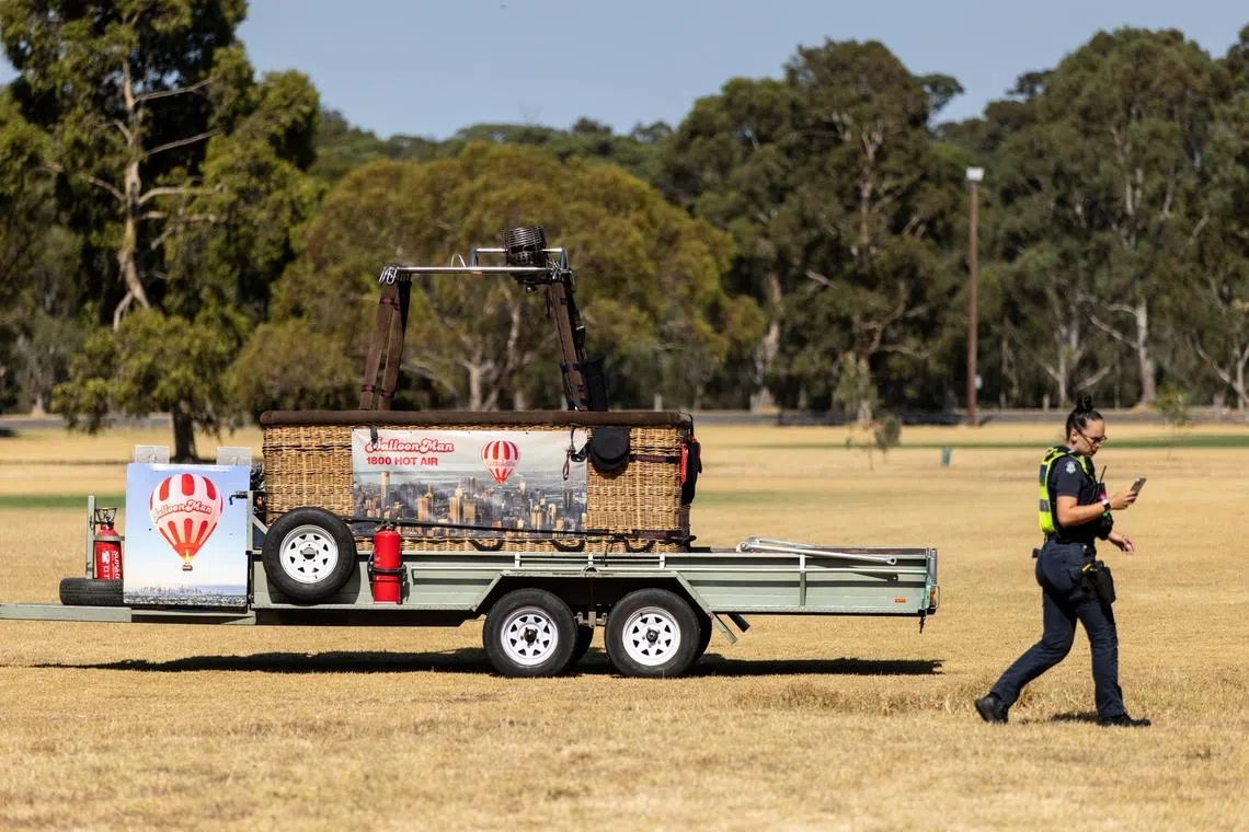 An emergency worker at Yarra Bend Park in Melbourne, where the hot-air balloon landed, on March 18.