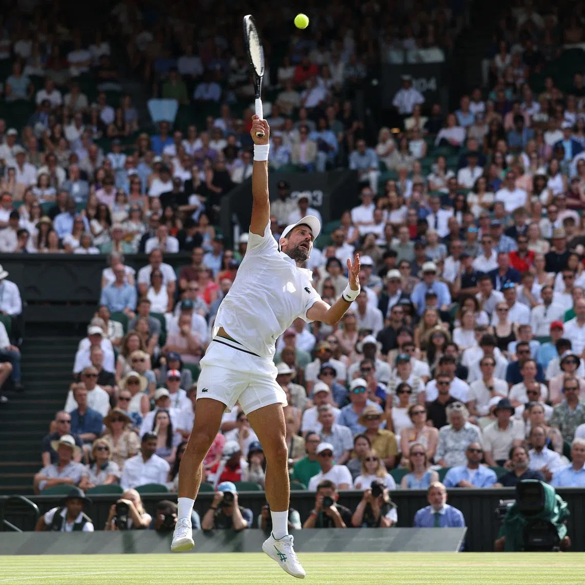 Tennis - Wimbledon - All England Lawn Tennis and Croquet Club, London, Britain - July 5, 2026 Serbia's Novak Djokovic in action during his fourth round match against Russia's Roman Safiullin REUTERS/Toby Melville