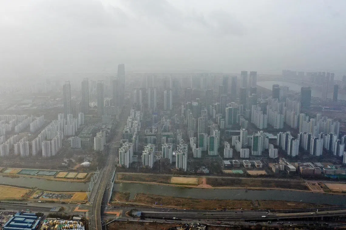 Songdo International City is blanketed in fine dust, in Incheon, South Korea, on Dec 13